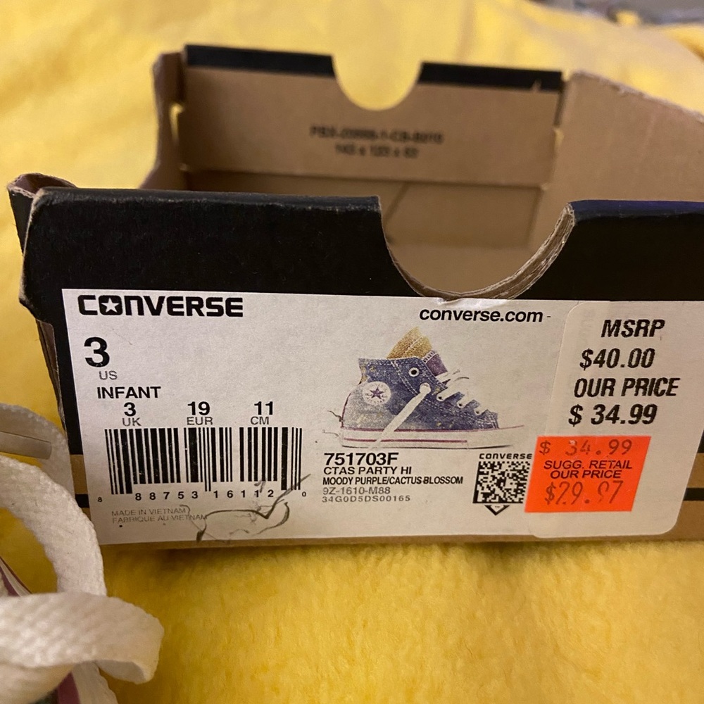 Converse paint splatter high tops.